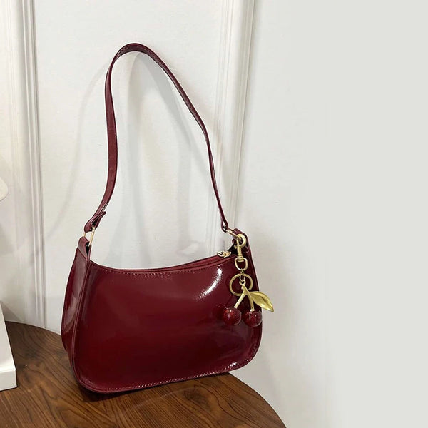Women-s-PU-Leather-Handbag-Versatile-Fashion-Solid-Color-Cherry-Pendant-Shoulder-Bag-Casual-Commuting-Bag.jpg